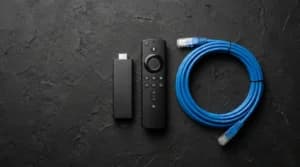 Amazon Fire TV Stick with remote control and Ethernet cable for IPTV setup