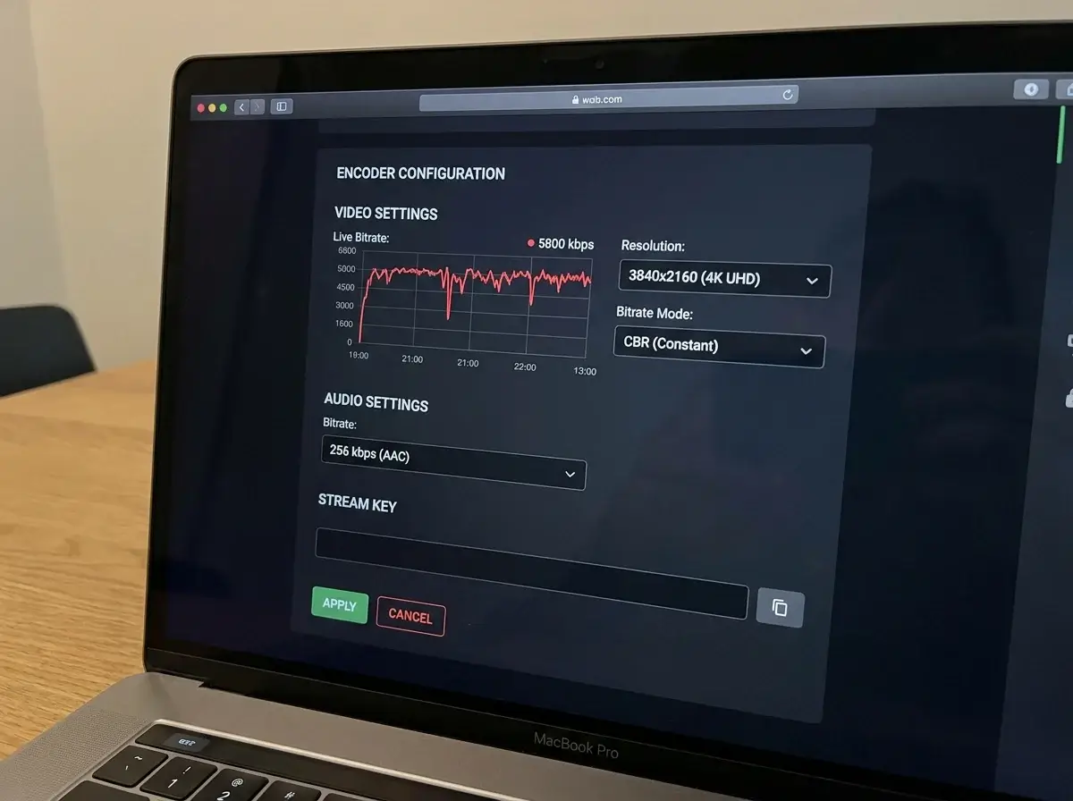 Broadcast engineer configuring hardware encoder settings for 4K IPTV stream
